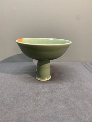A Chinese Longquan celadon stem cup and two saucers, Ming — photo 6