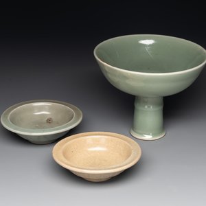 A Chinese Longquan celadon stem cup and two saucers, Ming — photo 1
