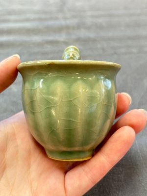 A Chinese Longquan celadon 'Trick Cup', Ming or later — photo 1