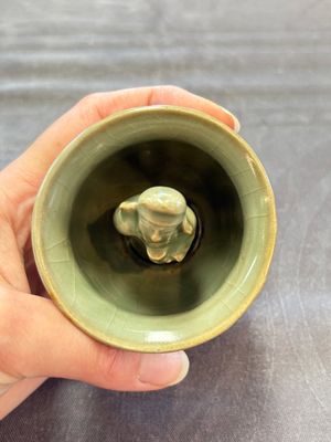 A Chinese Longquan celadon 'Trick Cup', Ming or later — photo 5