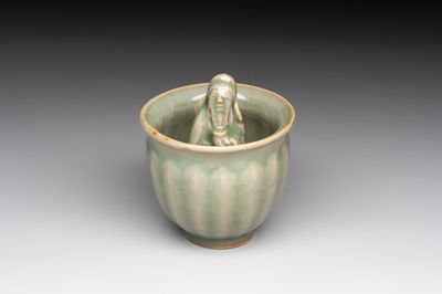 A Chinese Longquan celadon 'Trick Cup', Ming or later
