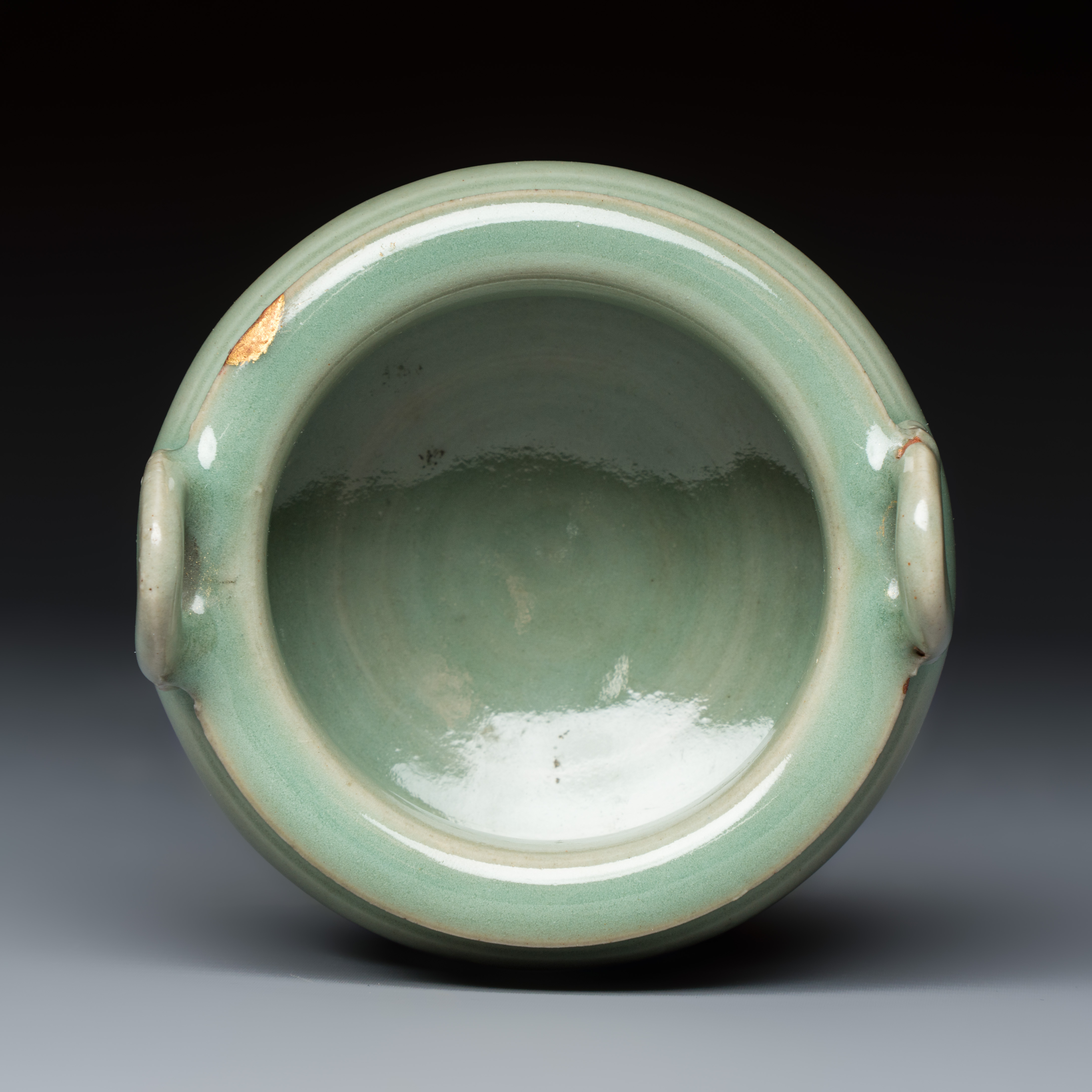 A Chinese Longquan celadon tripod censer with handles — photo 6