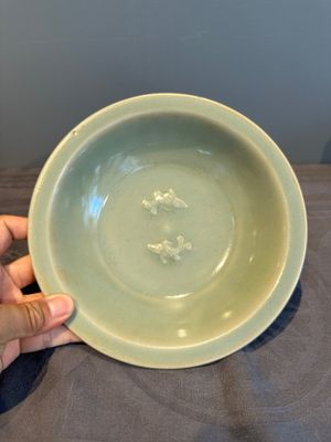 A Chinese Longquan celadon 'twin fish' plate, Yuan/Ming — photo 1