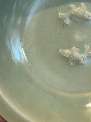 A Chinese Longquan celadon 'twin fish' plate, Yuan/Ming — photo 5