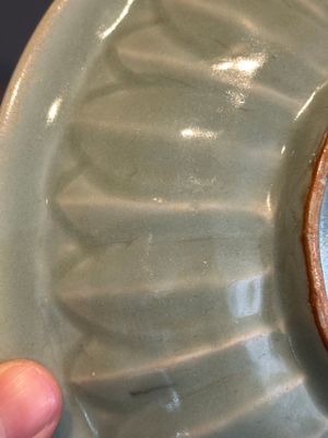 A Chinese Longquan celadon 'twin fish' plate, Yuan/Ming — photo 7