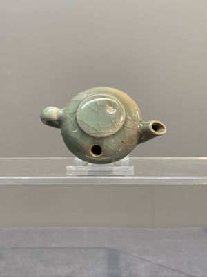 A Chinese Longquan celadon water dropper, Song — photo 5