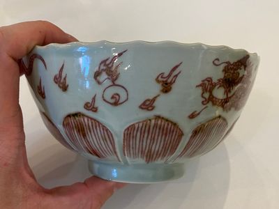 A Chinese lotus-molded 'dragon' bowl in copper-red on celadon-ground, Kangxi — photo 6