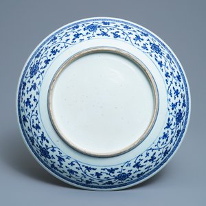 A Chinese Ming-style blue and white 'floral scroll' dish, Qianlong — photo 2