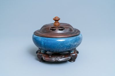 A Chinese monochrome blue censer with incised floral design, Ming