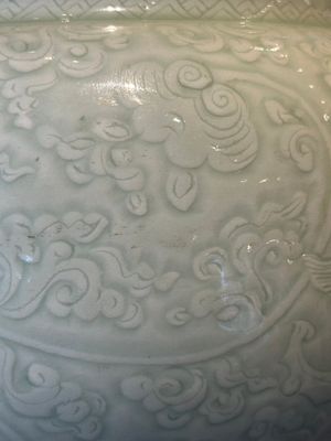 A Chinese monochrome celadon-glazed jar with anhua chilong and floral design, Kangxi — photo 11