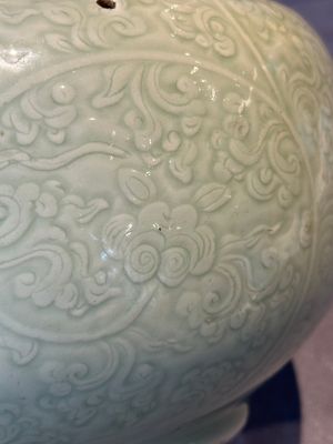 A Chinese monochrome celadon-glazed jar with anhua chilong and floral design, Kangxi — photo 8