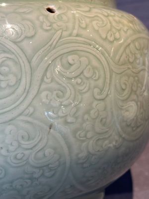 A Chinese monochrome celadon-glazed jar with anhua chilong and floral design, Kangxi — photo 9