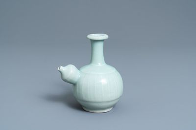 A Chinese monochrome celadon-glazed kendi, 19th C.