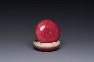 A Chinese monochrome copper-red-glazed box and cover, Kangxi mark, 20th C.