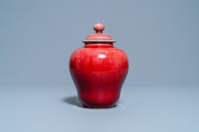 A Chinese monochrome copper red vase and cover, Qianlong/Jiaqing