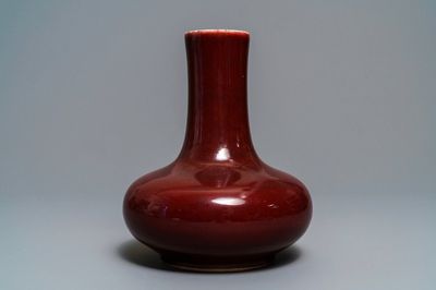 A Chinese monochrome red bottle vase, Kangxi