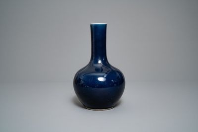 A Chinese monochrome 'sacrifical blue' bottle vase, Qianlong mark and of the period