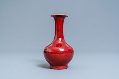 A Chinese monochrome sang de boeuf-glazed bottle vase, 19th C.