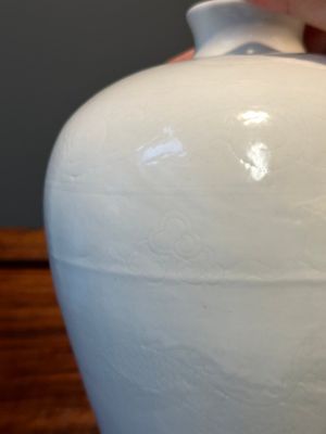 A Chinese monochrome white-glazed 'meiping' vase with anhua dragon design, 19th C. — photo 13
