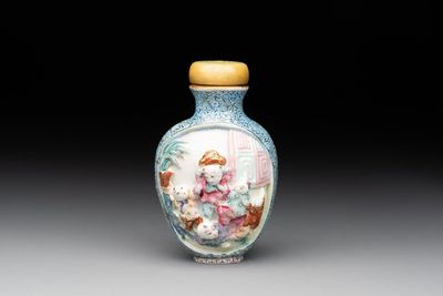 A Chinese moulded famille rose 'playing boys' snuff bottle, Qianlong mark, 19th C.