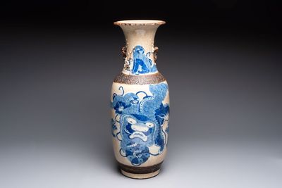 A Chinese Nanking blue and white crackle-glazed 'Buddhist lion' vase, Chenghua mark, 19th C.