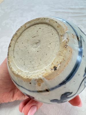 A Chinese Nanking water pot, a blue and white brush pot, a jarlet and a trick cup, Ming and later — photo 13