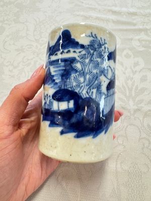 A Chinese Nanking water pot, a blue and white brush pot, a jarlet and a trick cup, Ming and later — photo 14
