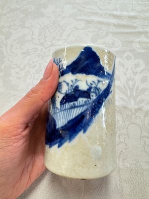 A Chinese Nanking water pot, a blue and white brush pot, a jarlet and a trick cup, Ming and later — photo 17