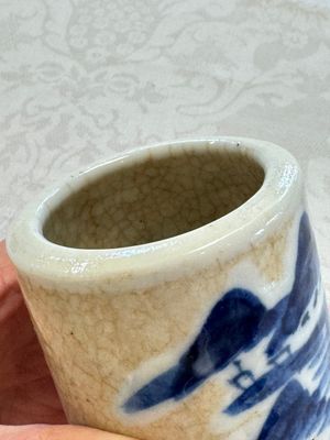 A Chinese Nanking water pot, a blue and white brush pot, a jarlet and a trick cup, Ming and later — photo 22
