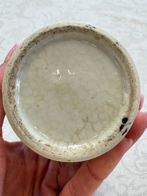 A Chinese Nanking water pot, a blue and white brush pot, a jarlet and a trick cup, Ming and later — photo 23