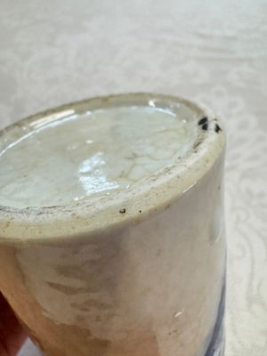 A Chinese Nanking water pot, a blue and white brush pot, a jarlet and a trick cup, Ming and later — photo 25