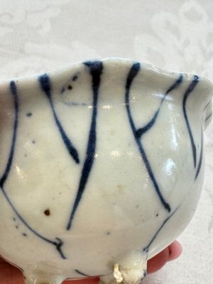 A Chinese Nanking water pot, a blue and white brush pot, a jarlet and a trick cup, Ming and later — photo 29