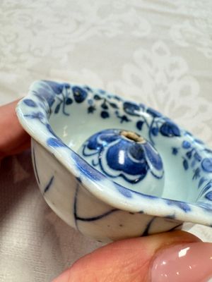 A Chinese Nanking water pot, a blue and white brush pot, a jarlet and a trick cup, Ming and later — photo 31