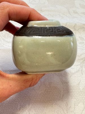 A Chinese Nanking water pot, a blue and white brush pot, a jarlet and a trick cup, Ming and later — photo 39