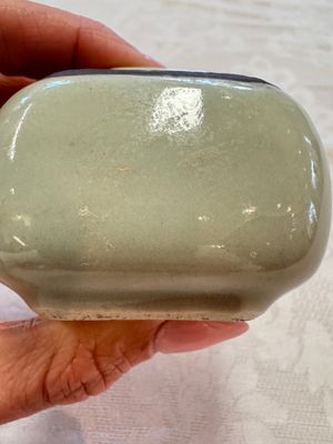 A Chinese Nanking water pot, a blue and white brush pot, a jarlet and a trick cup, Ming and later — photo 41