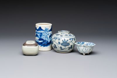 A Chinese Nanking water pot, a blue and white brush pot, a jarlet and a trick cup, Ming and later