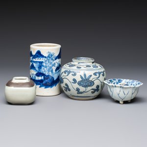 A Chinese Nanking water pot, a blue and white brush pot, a jarlet and a trick cup, Ming and later — photo 1