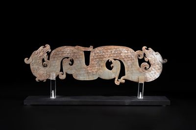 A Chinese nephrite jade ark-shaped 'chilong' plaque, Zhou/Han