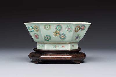 A Chinese octagonal famille rose celadon-ground 'Brocade Balls' offering bowl on a wooden stand, Daoguang mark, 19th C.
