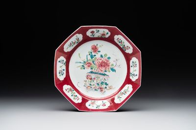 A Chinese octagonal famille rose ruby border plate with a flower basket, Yongzheng