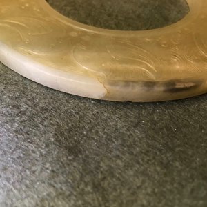 A Chinese pale celadon jade bi disc, Ming or earlier — photo 12