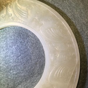 A Chinese pale celadon jade bi disc, Ming or earlier — photo 17