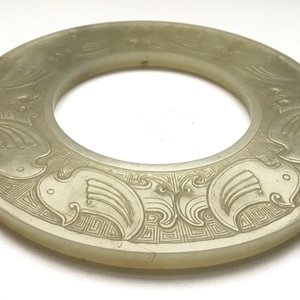 A Chinese pale celadon jade bi disc, Ming or earlier — photo 32