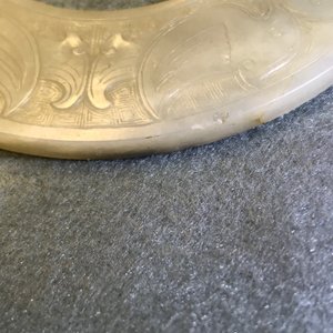 A Chinese pale celadon jade bi disc, Ming or earlier — photo 21