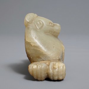A Chinese pale greenish-grey and brown jade model of a mythical beast, Qing — photo 3