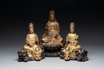 A Chinese parcel-gilt bronze Guanyin and a pair of Bodhisattvas, 20th C.