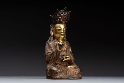 A Chinese parcel-gilt bronze Guanyin, Ming