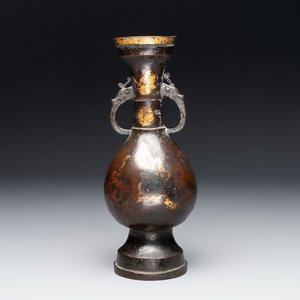 A Chinese parcel-gilt bronze vase with dragon-form handles, Yuan/Ming — photo 1