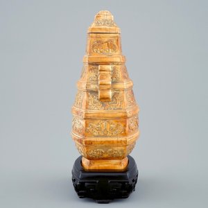 A Chinese parcel-gilt ivory vase and cover on wooden stand, 19th C. — photo 3