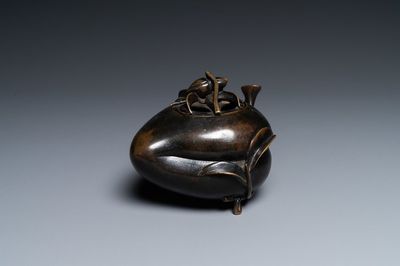 A Chinese peach-shaped bronze censer and cover, Qing